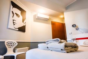 Giường trong phòng chung tại GUANAKO Hostel