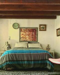 A bed or beds in a room at casa individual en casco antiguo de tarragona