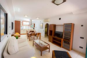 Χώρος καθιστικού στο Apartamentos Olympia