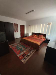 Postel nebo postele na pokoji v ubytování Vila Isabela + 6 fotografií