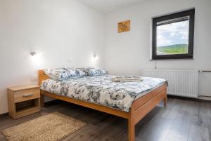 Postel nebo postele na pokoji v ubytování Apartments Matko