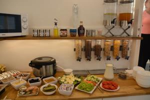 a kitchen counter with a bunch of food on it at Wellness Vila Bohemia in Prague