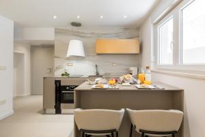 Кухня или мини-кухня в Park Residence
