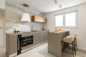 Кухня или мини-кухня в Park Residence
 +37 фотографий