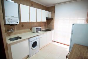 Kuchyň nebo kuchyňský kout v ubytování Pisos Centro Ribadesella