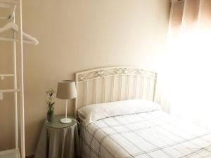 Postel nebo postele na pokoji v ubytování Pisos Centro Ribadesella