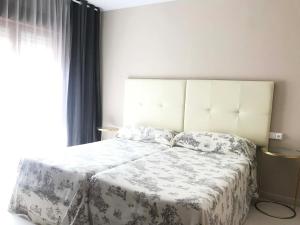 Postel nebo postele na pokoji v ubytování Pisos Centro Ribadesella