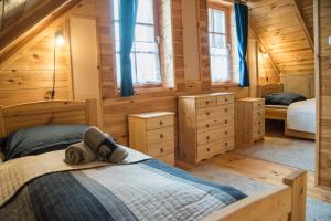 Posteľ alebo postele v izbe v ubytovaní Pine Cottage