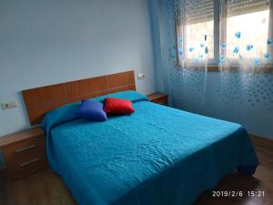 Łóżko lub łóżka w pokoju w obiekcie Nores Buenavista