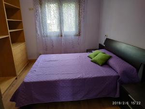 Łóżko lub łóżka w pokoju w obiekcie Nores Buenavista