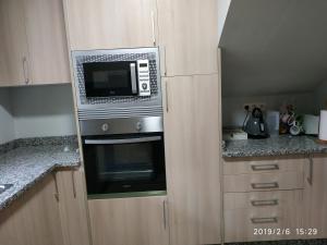 Kuchnia lub aneks kuchenny w obiekcie Nores Buenavista