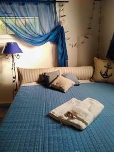 Postel nebo postele na pokoji v ubytování Sevi Platamon Home