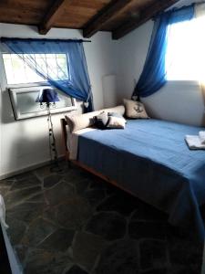 Postel nebo postele na pokoji v ubytování Sevi Platamon Home