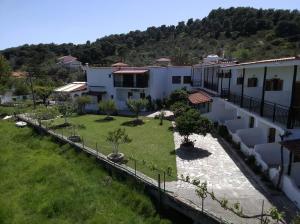 an aerial view of a house with a yard at Vontzos Hotel in Achladies