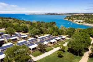 an aerial view of a resort with a lake at Mobile Homes - Lanterna Premium Camping Resort in Poreč