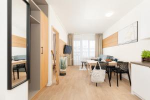 Telewizja i/lub zestaw kina domowego w obiekcie Aquamarina Onyx Marina Invest