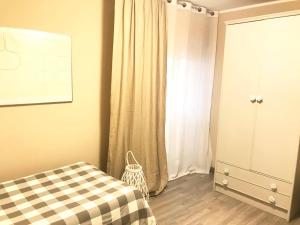 Postel nebo postele na pokoji v ubytování Pisos Centro Ribadesella