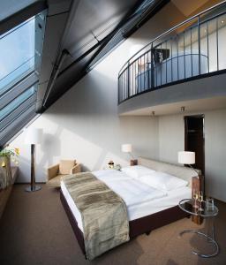 Cama ou camas em um quarto em Mövenpick Hotel Hamburg