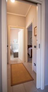 A bed or beds in a room at A due passi dal Castello