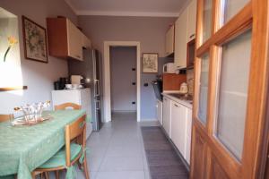 A kitchen or kitchenette at A due passi dal Castello