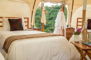 Krevet ili kreveti u jedinici u objektu Kinkara Luxury Retreat