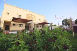 Zahrada ubytování Al Khuzama Resort