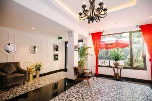 Posezení v ubytování Rosa Hanoi Hotel