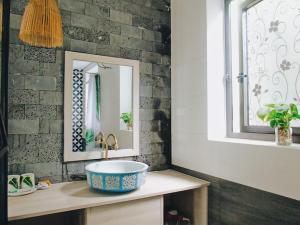 Koupelna v ubytování Xanh Lá Homestay Hội An + 37 fotografií