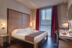 Posteľ alebo postele v izbe v ubytovaní Best Western Hotel San Marco