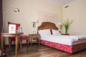 Voodi või voodid majutusasutuse Hotel Rejs toas