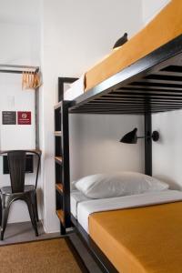 Postel nebo postele na pokoji v ubytování Gomez House