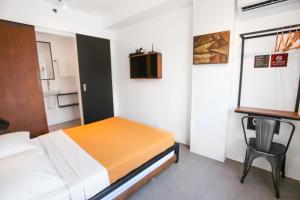 Postel nebo postele na pokoji v ubytování Gomez House