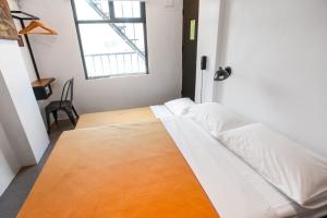 Postel nebo postele na pokoji v ubytování Gomez House