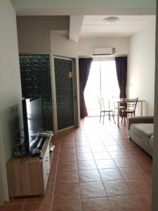 TV a/nebo společenská místnost v ubytování Avatara condo B22 A