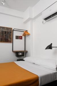 Postel nebo postele na pokoji v ubytování Gomez House
