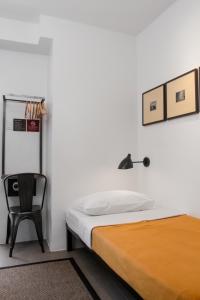 Postel nebo postele na pokoji v ubytování Gomez House