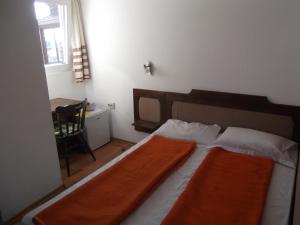 Cama o camas de una habitación en Guest House Fanari