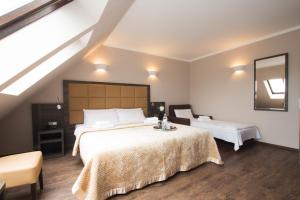 Postel nebo postele na pokoji v ubytování Hotel Delta am Potsdamer Platz