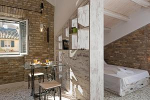 Posteľ alebo postele v izbe v ubytovaní Agion Apostolon Loft!