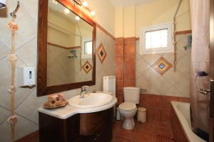 O baie la Alex Studios & Apartments