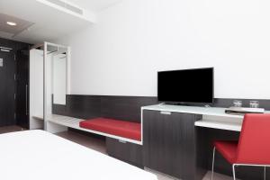 Telewizja i/lub zestaw kina domowego w obiekcie Axor Feria