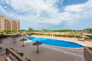 Bazén v ubytování Apartamentos Jardines del Mar II nebo v jeho okolí