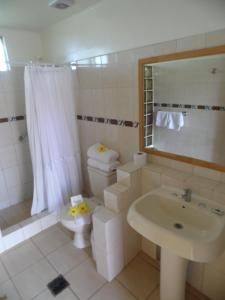 Baðherbergi á Hotel Manutara