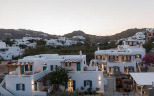 an aerial view of a white house at sunset at Esperides in Platis Gialos