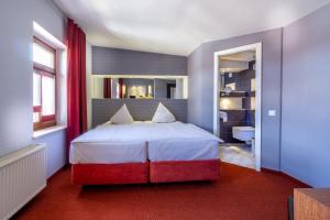Postel nebo postele na pokoji v ubytování SL'otel - Das StadtHotel - voll Klimatisiert
