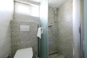 Kúpeľňa v ubytovaní Apartmani Gojević + 37 fotografií