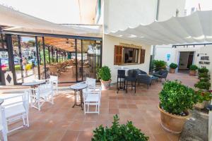 Restauracja lub miejsce do jedzenia w obiekcie Bell Port Hotel