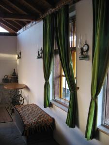 Χώρος καθιστικού στο Guest House Astra