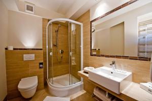 Koupelna v ubytování Hotel Tumski + 36 fotografií