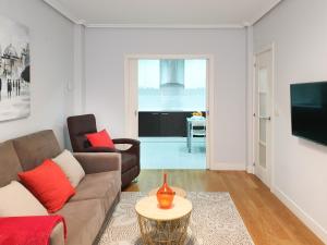 A television and/or entertainment centre at Sausalito - Iberorent Apartments